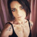 Lexi Tampa escort brunette selfie in black top